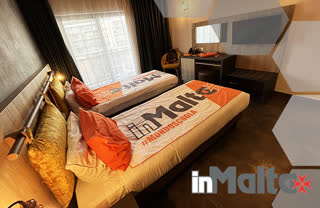 Orange Hotels Collection inMalta – Choice 20: terrazzo reception con vista Mercury Towers